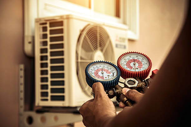 Professional Hvac technician working in Fond du Lac, WI